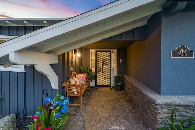 210 View Dr, La Habra, CA 90631 - property entrance featuring board and batten siding and stucco siding