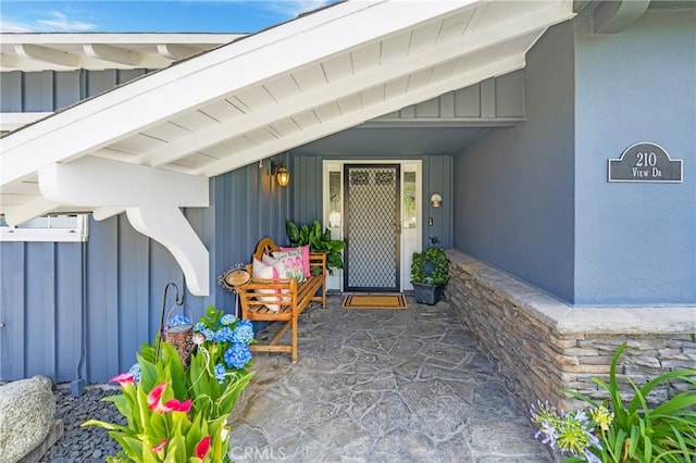 210 View Dr, La Habra, CA 90631 - doorway to property with board and batten siding