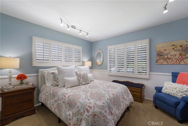 210 View Dr, La Habra, CA 90631 - carpeted bedroom with track lighting and baseboards