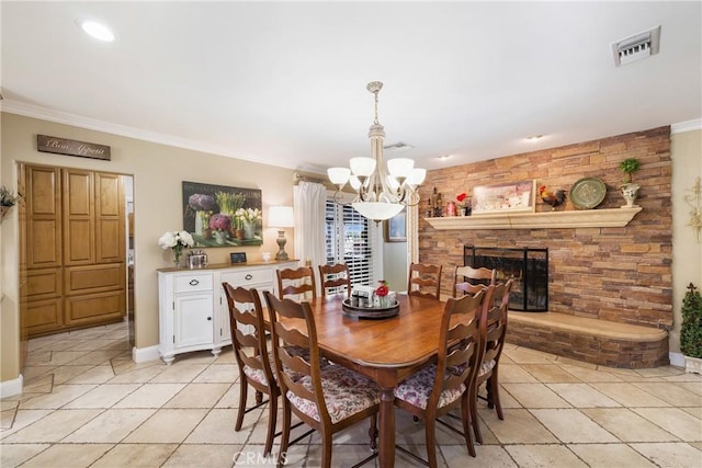 210 View Dr, La Habra, CA 90631 - dining room featuring a chandelier, light tile patterned floors, ornamental molding, baseboards, and a fireplace