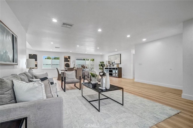 2842 E Virginia Ave, Anaheim, CA 92806 - living area with light wood-type flooring, recessed lighting, and baseboards