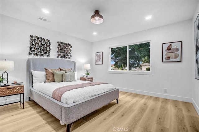 2842 E Virginia Ave, Anaheim, CA 92806 - bedroom featuring light wood-style floors, baseboards, and recessed lighting