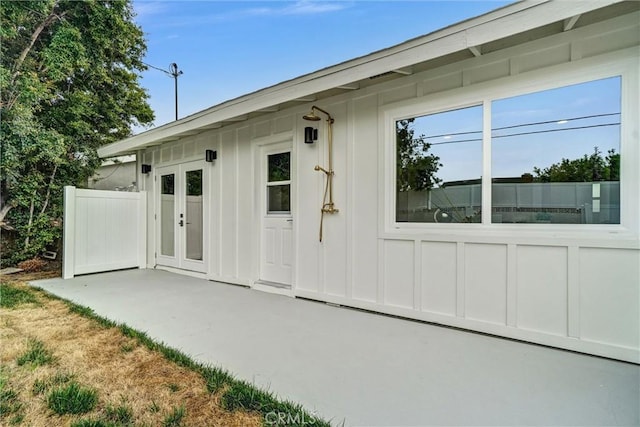 2842 E Virginia Ave, Anaheim, CA 92806 - doorway to property featuring board and batten siding and a patio