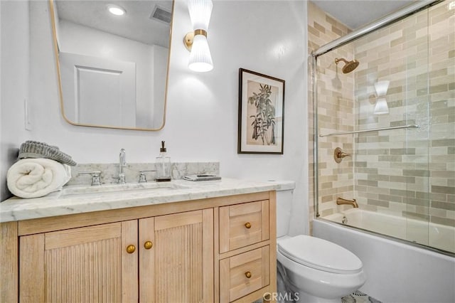 2842 E Virginia Ave, Anaheim, CA 92806 - bathroom featuring vanity, toilet, and shower / bath combination with glass door