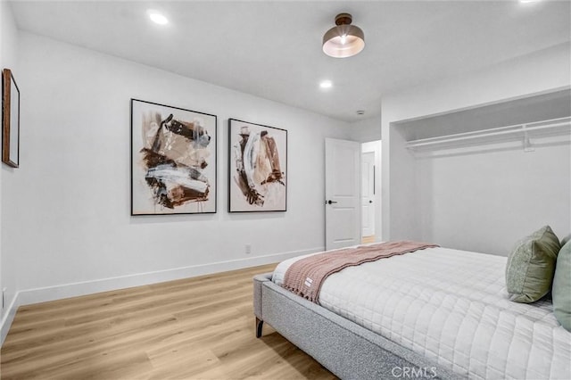 2842 E Virginia Ave, Anaheim, CA 92806 - bedroom with light wood-style floors, baseboards, recessed lighting, and a closet