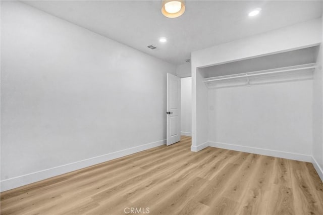2842 E Virginia Ave, Anaheim, CA 92806 - unfurnished bedroom featuring baseboards, wood finished floors, recessed lighting, and a closet
