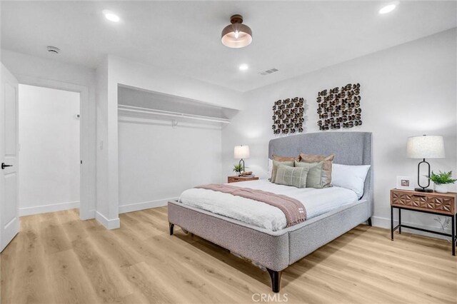 2842 E Virginia Ave, Anaheim, CA 92806 - bedroom featuring light wood-style floors, baseboards, recessed lighting, and a closet