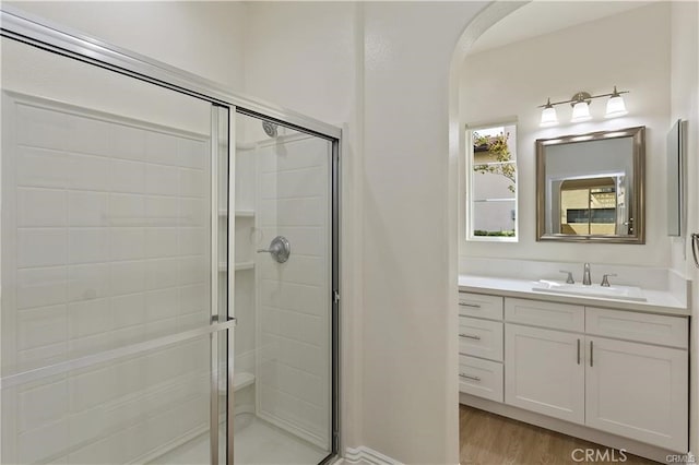 4304 Owens St Unit 102, Corona, CA 92883 - full bath featuring a shower stall, vanity, and wood finished floors