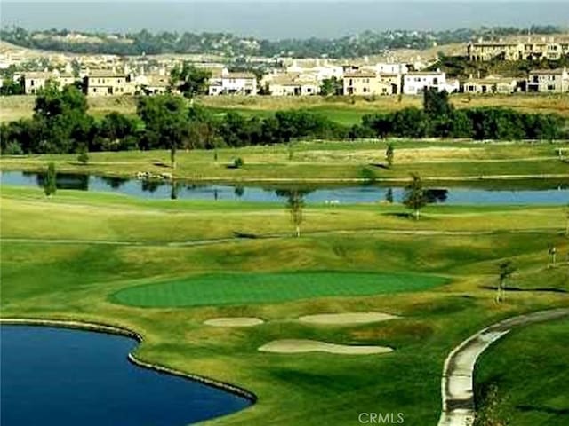 4304 Owens St Unit 102, Corona, CA 92883 - view of home's community with view of golf course, a water view, and a residential view