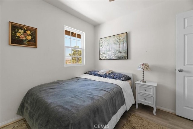 22025 Del Oro Rd, Apple Valley, CA 92308 - bedroom featuring wood finished floors and baseboards