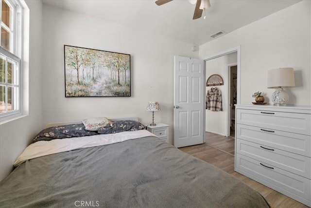 22025 Del Oro Rd, Apple Valley, CA 92308 - bedroom with light wood finished floors and a ceiling fan