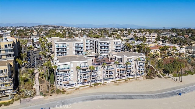 1500 E Ocean Blvd Unit 419, Long Beach, CA 90802 - aerial view of property's location featuring a mountain backdrop and apartment complex / building