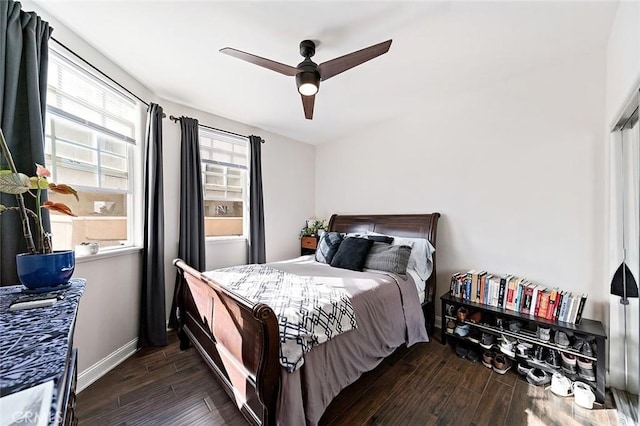 1500 E Ocean Blvd Unit 419, Long Beach, CA 90802 - bedroom featuring dark wood-style flooring, a ceiling fan, and baseboards