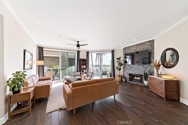 1500 E Ocean Blvd Unit 419, Long Beach, CA 90802 - living area with a lit fireplace, ornamental molding, dark wood finished floors, ceiling fan, and baseboards