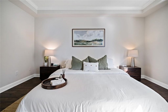 1500 E Ocean Blvd Unit 419, Long Beach, CA 90802 - bedroom featuring ornamental molding, dark wood-style floors, baseboards, and a tray ceiling