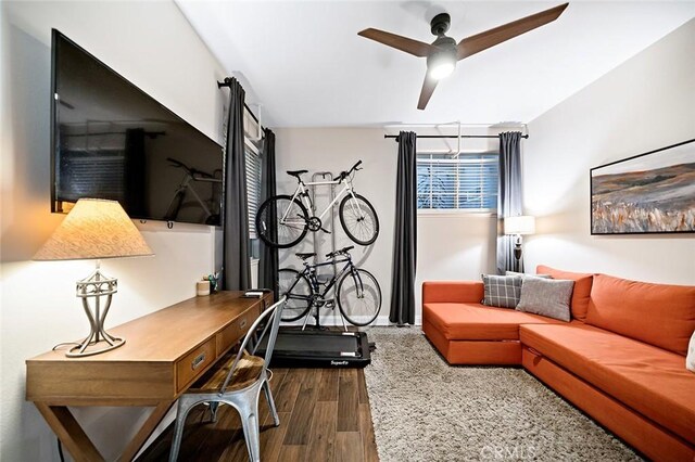 1500 E Ocean Blvd Unit 419, Long Beach, CA 90802 - home office featuring dark wood finished floors, ceiling fan, and baseboards