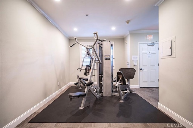 1500 E Ocean Blvd Unit 419, Long Beach, CA 90802 - exercise room with baseboards, ornamental molding, electric panel, recessed lighting, and wood finished floors
