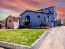 3208 W 74th St, Los Angeles, CA 90043 - view of front of home featuring a front lawn and driveway