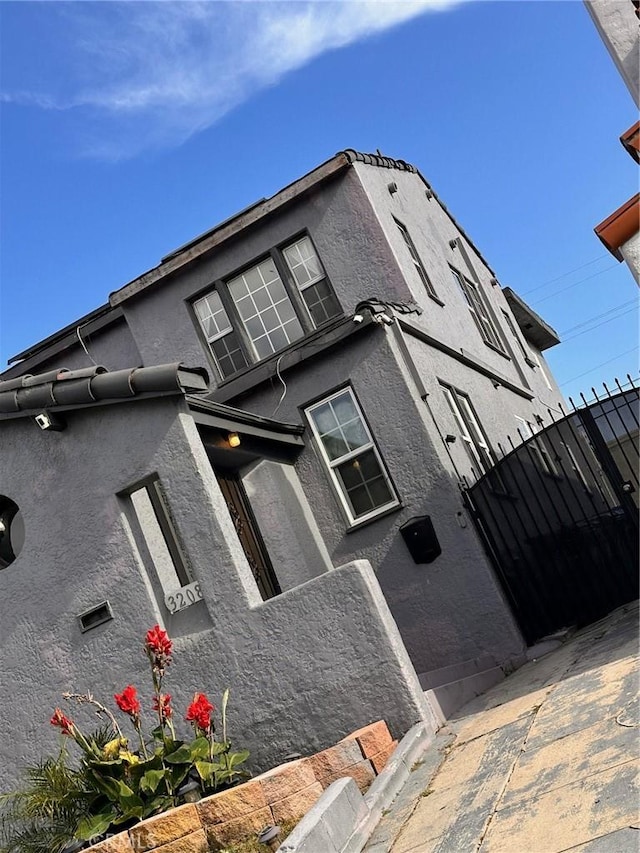 3208 W 74th St, Los Angeles, CA 90043 - view of property exterior with stucco siding