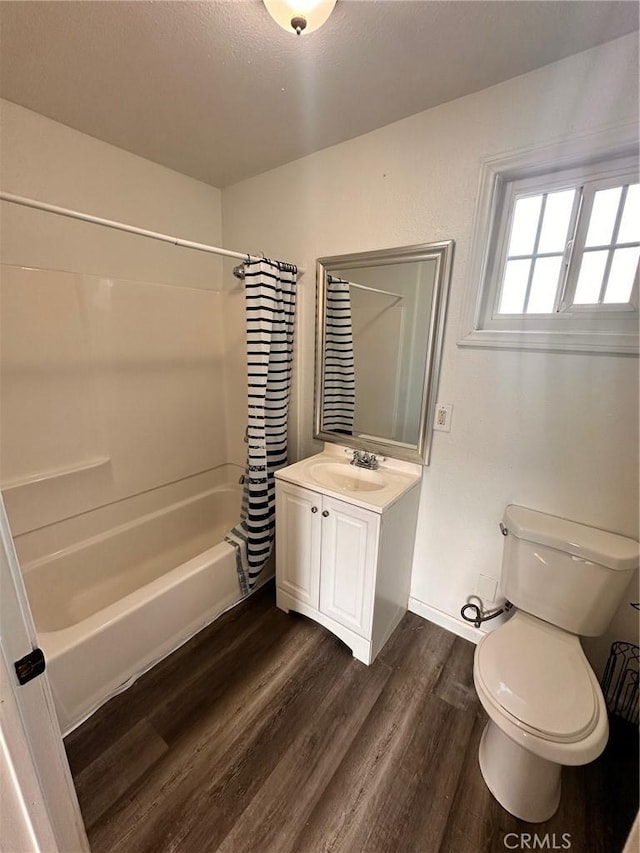 3208 W 74th St, Los Angeles, CA 90043 - bathroom featuring shower / tub combo with curtain, wood finished floors, and vanity
