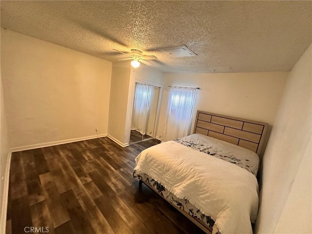 3208 W 74th St, Los Angeles, CA 90043 - bedroom with dark wood-style floors, ceiling fan, and a textured ceiling