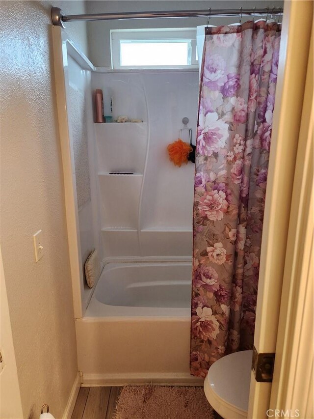 445 Almond Dr Unit 84, Lodi, CA 95240 - full bathroom with toilet, shower / bath combo, and baseboards