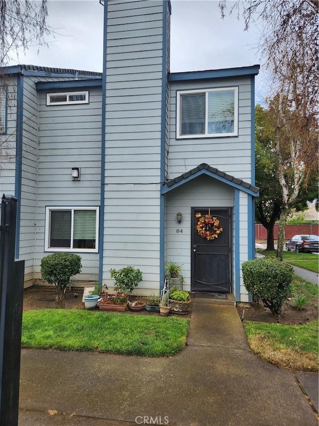 445 Almond Dr Unit 84, Lodi, CA 95240 - townhome / multi-family property with a chimney