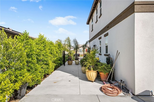 36275 Firelight Cir, Wildomar, CA 92595 - view of home's exterior featuring stucco siding and a patio