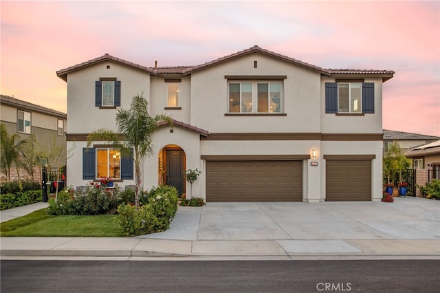36275 Firelight Cir, Wildomar, CA 92595 - mediterranean / spanish-style house featuring a tile roof, an attached garage, and stucco siding