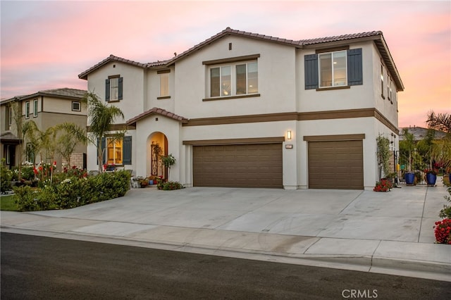 36275 Firelight Cir, Wildomar, CA 92595 - mediterranean / spanish-style house featuring a tiled roof, a garage, stucco siding, and concrete driveway