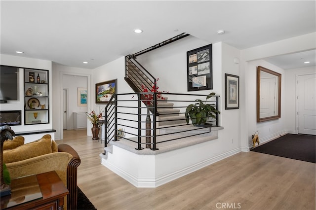 36275 Firelight Cir, Wildomar, CA 92595 - staircase featuring wood finished floors and recessed lighting