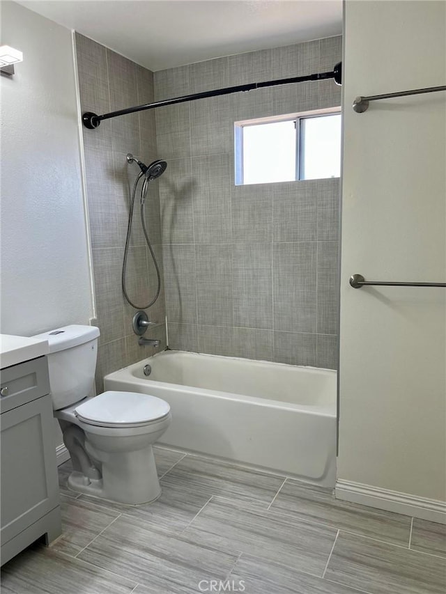 428 N Chapel Ave Unit B, Alhambra, CA 91801 - full bath with vanity, toilet, tub / shower combination, tile patterned flooring, and baseboards