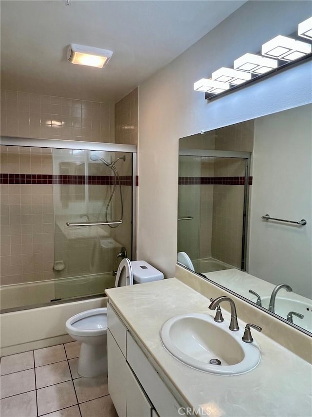 428 N Chapel Ave Unit B, Alhambra, CA 91801 - bathroom with toilet, vanity, tile patterned flooring, and shower / bath combination with glass door
