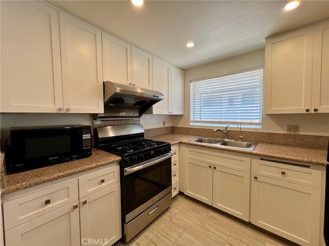 428 N Chapel Ave Unit B, Alhambra, CA 91801 - kitchen featuring stainless steel range with gas stovetop, black microwave, a sink, under cabinet range hood, and recessed lighting