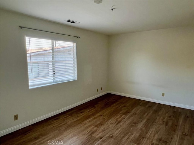 428 N Chapel Ave Unit B, Alhambra, CA 91801 - unfurnished room featuring dark wood-type flooring, baseboards, and fire sprinkler in ceiling