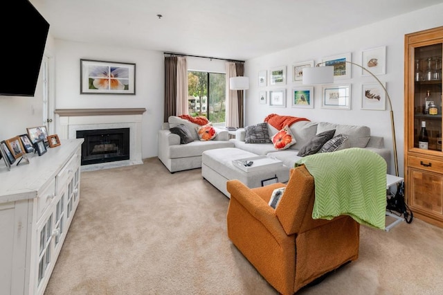 11255 Tierrasanta Blvd Unit 106, San Diego, CA 92124 - living room featuring light carpet and a fireplace with flush hearth