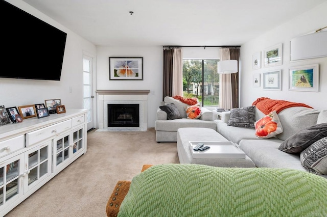 11255 Tierrasanta Blvd Unit 106, San Diego, CA 92124 - living room featuring plenty of natural light, a fireplace with flush hearth, and light colored carpet