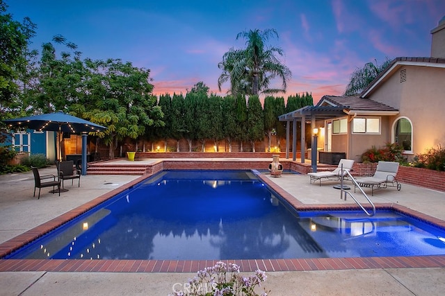 19520 Bermudas St, Porter Ranch, CA 91326 - view of swimming pool with a pergola and a patio area