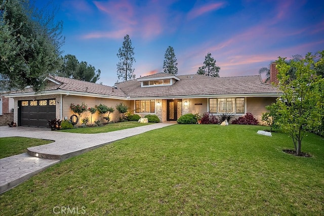 19520 Bermudas St, Porter Ranch, CA 91326 - view of front of house with an attached garage, a front yard, decorative driveway, a tile roof, and a chimney