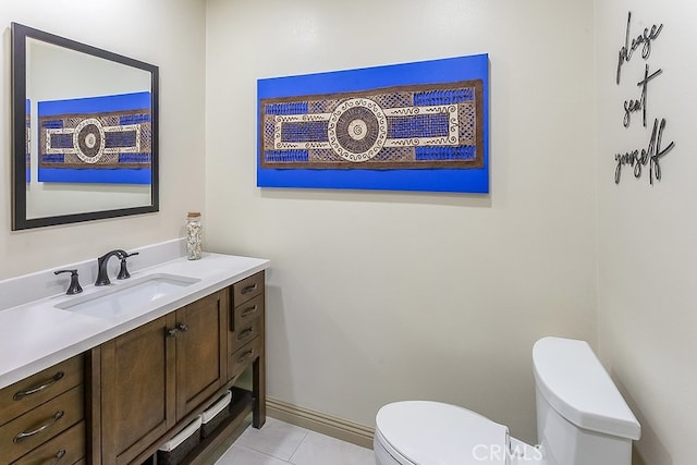 19520 Bermudas St, Porter Ranch, CA 91326 - bathroom featuring toilet, vanity, tile patterned flooring, and baseboards