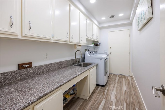 24711 Eloisa Dr, Mission Viejo, CA 92691 - washroom with light wood-style floors, washing machine and dryer, cabinet space, recessed lighting, and baseboards