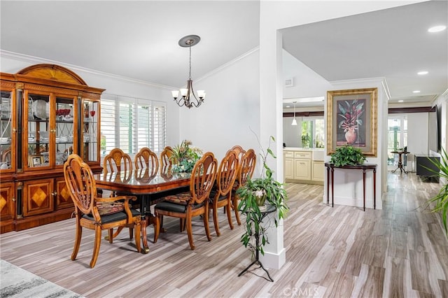 24711 Eloisa Dr, Mission Viejo, CA 92691 - dining space with light wood-type flooring, healthy amount of natural light, a chandelier, ornamental molding, and recessed lighting