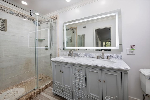 24711 Eloisa Dr, Mission Viejo, CA 92691 - full bath featuring a stall shower, toilet, crown molding, double vanity, and recessed lighting