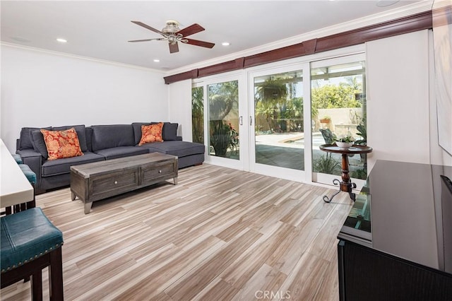 24711 Eloisa Dr, Mission Viejo, CA 92691 - living room with ornamental molding, ceiling fan, healthy amount of natural light, light wood finished floors, and recessed lighting
