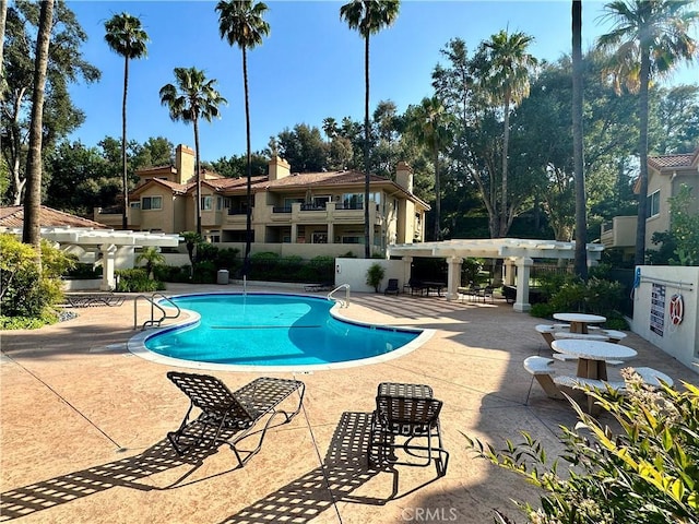 25843 Mcbean Unit 9, Valencia, CA 91355 - community pool featuring a pergola and a patio