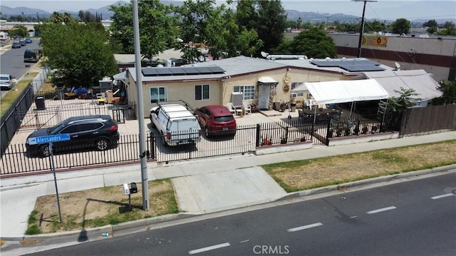 24910 Allesandro, Moreno Valley, CA 92553 - exterior space featuring a fenced front yard and a mountain view