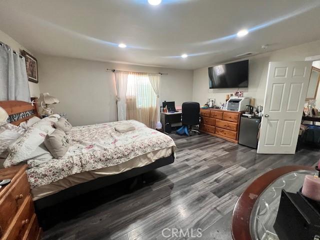 24910 Allesandro, Moreno Valley, CA 92553 - bedroom featuring dark wood-type flooring, an office area, fridge, and recessed lighting