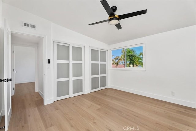 21692 Seaside Ln, Huntington Beach, CA 92646 - unfurnished room featuring light wood finished floors, a ceiling fan, baseboards, and vaulted ceiling