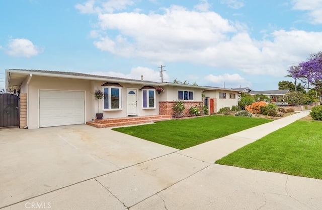 117 E 229th Pl, Carson, CA 90745 - ranch-style house with concrete driveway, an attached garage, a front lawn, and stucco siding