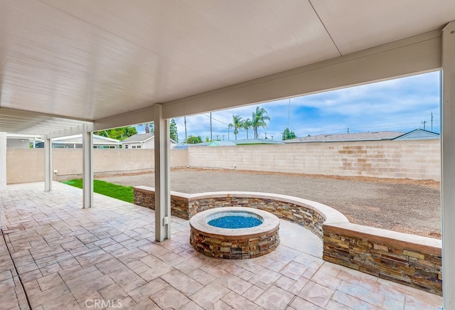 117 E 229th Pl, Carson, CA 90745 - fenced backyard with a fire pit and a patio
